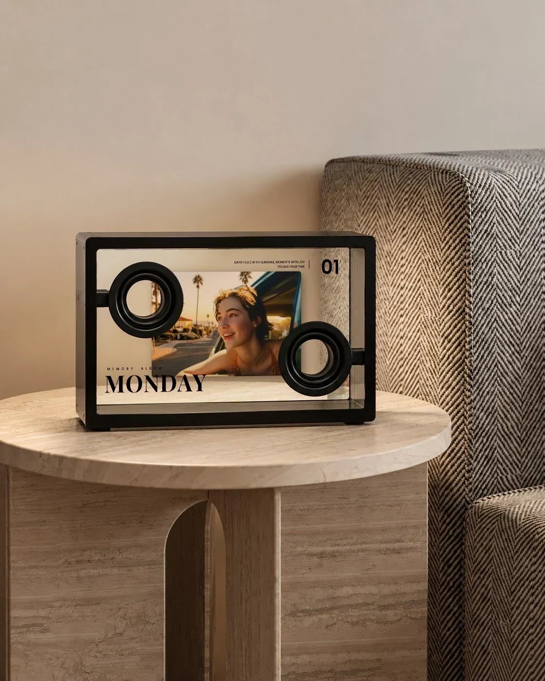 Speaker displaying a personal photo on a side table