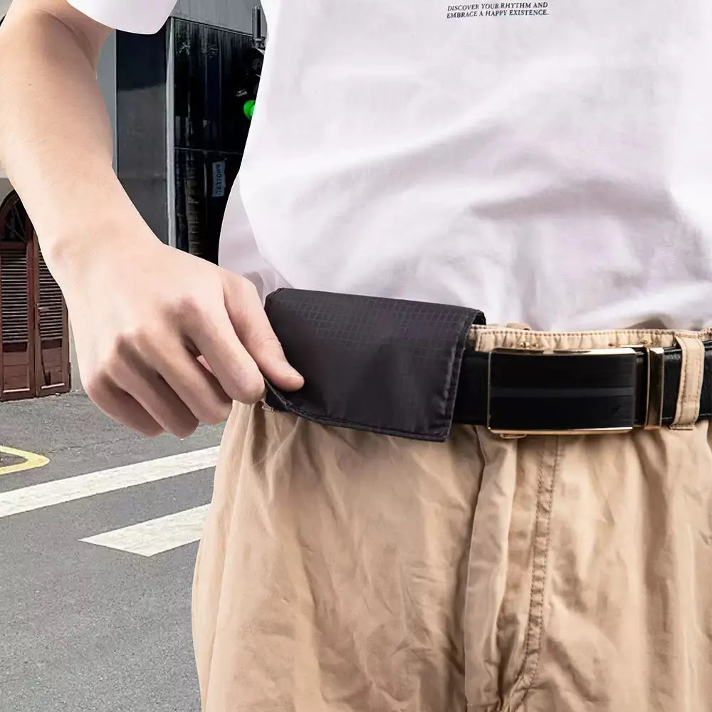 Traveler fastening passport pouch on a belt
